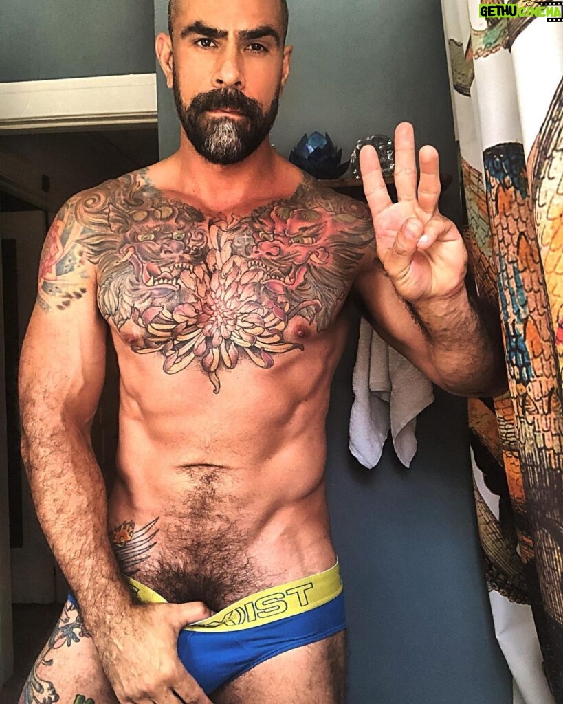 Israel Zamora Instagram - Three looks for the photoshoot last night and 5 hours of sleep. Let’s get this day going! #bathroomselfie #instagay #underwear #beard #tattoo #muscle #daddy #scuffygay #homo #gaymuscles