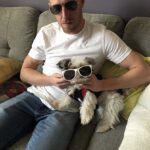 James Cipperly Instagram - Instead here's us holding pups. . . . #friday #dogs #springbreak #sunglasses