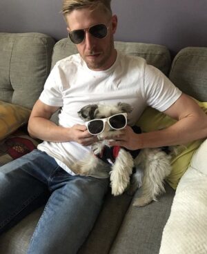 James Cipperly Instagram - Instead here's us holding pups.
.
.
.
#friday #dogs #springbreak #sunglasses