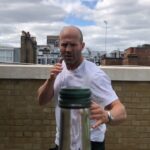 Jason Statham Instagram - #bottlecapchallenge #challengeaccepted @erlsn.acr This thing landed on my head from @johnmayer but will quickly go to a couple of fellas we’ve seen do push ups badly. All yours @guyritchie and @jmoontasri