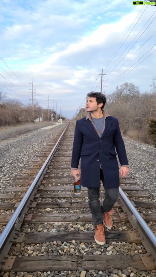Jayson Blair Instagram - Had so much fun playing around on the train tracks making my 1st reel with @westwardwhiskey This single malt distillation and package highlights the highest quality you would expect from the American Northwest #westwardexplorer