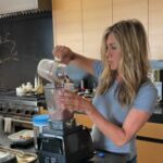 Jennifer Aniston Instagram - Good Morning ☺️ @vitalproteins ⁣⁣ ⁣⁣ Favorite smoothie: ⁣⁣ - 1 cup of Chocolate Almond Milk ⁣⁣ - 2 scoops of Vital Proteins Chocolate Collagen Peptides ⁣⁣ - Cherries and Banana 🍒🍌⁣⁣ - A few drops of Stevia ⁣⁣ - Antioxidants ⁣⁣ - 1 cup of ice⁣⁣ ⁣⁣ Other key players not shown but always added: ⁣ - Spinach ⁣⁣ - Pinch of cinnamon ⁣⁣ - Matcha powder ⁣⁣ - Spoonful of Almond Butter ⁣⁣ ⁣⁣ …That’s it!