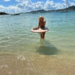Jennifer Finnigan Instagram - One more drop from our little holiday…I know I know “Enough already Finnigan!!!” I’m even annoying myself with these pics. But it was all so blue and so warm and so gorgeous!!!! And yes that’s a damn bistro table in the ocean (and a damn Pina Colada in my hand)!!!! Also the lizard. Iguana?😳) 💙💙💙 #stmaarten #caribbean #dreamvacation Ilét Pinel, Pinel Island, French West India