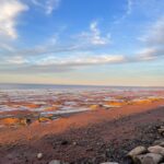 Jennifer Finnigan Instagram - Coolest filming location EVER. The Bay of Fundy has the fastest rising tides in the world!! It’s also a UNESCO World Heritage Site because its beaches and shorelines have “the world’s most complete fossil record of life 300 million years ago”. The last pic is what the shoreline (and water level) looked like when I first started filming, and the video I took is from less than 2 hrs later. Amazing!!!!! #novascotia #novascotiatravel #bayoffundy @moonshineseries Bay Of Fundy Nova Scotia