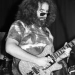 Jerry Garcia Instagram - Jerry and Wolf on this date in 1978 at Selland Arena in Fresno, shot by Ed Perlstein. 🐺