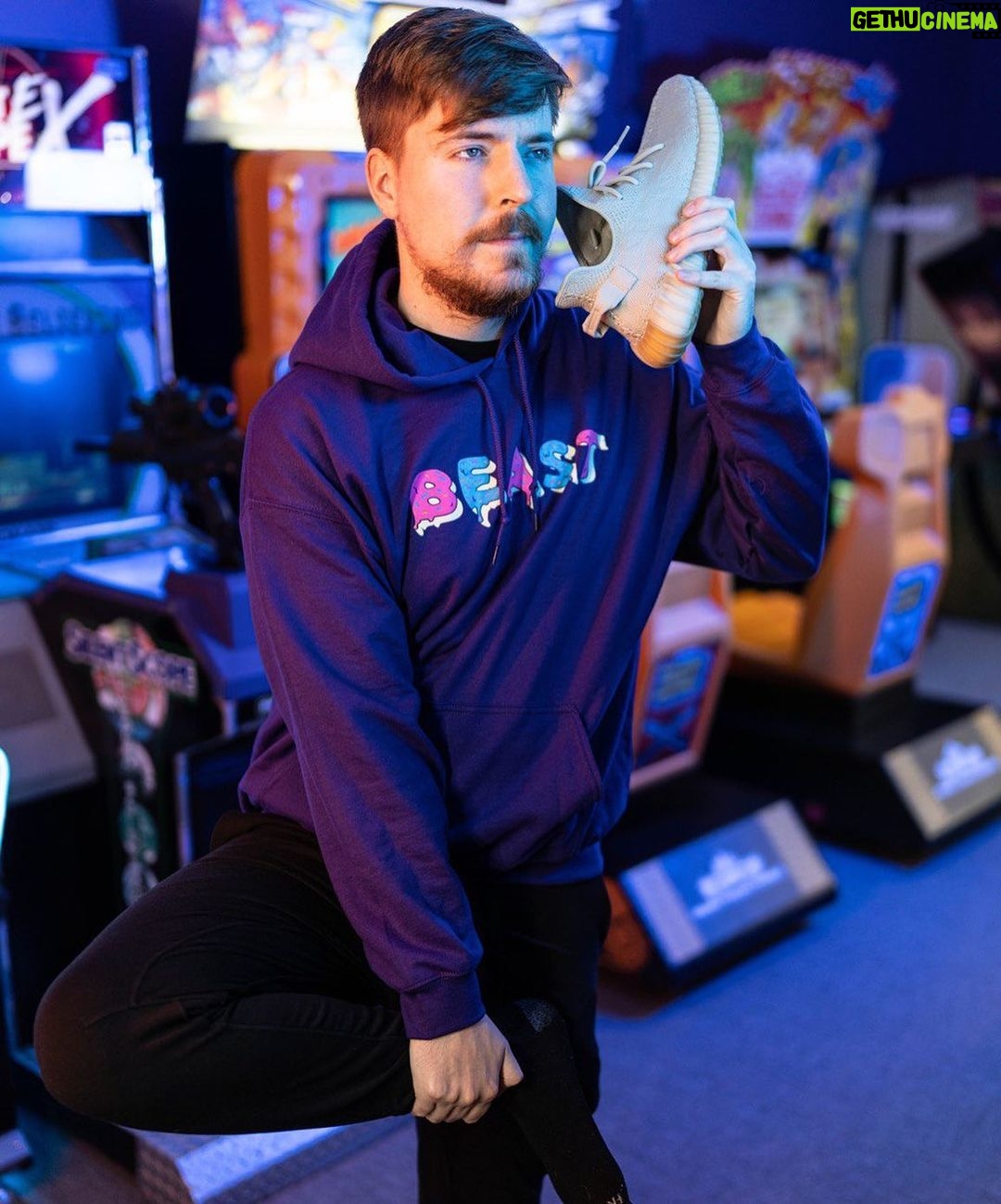 Jimmy Donaldson Instagram - I’m calling you with my shoe to let you know that you only have two days left to buy this limited edition Purple hoodie/shirt before it’s gone forever! Me, Chandler, Chris, and Karl will FaceTime (or zoom if you don’t have an iPhone) 100 random people that buy it! Click the link in my bio!!!