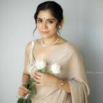 Jisma Jiji Instagram - 📸: @athul_krishna________ STYLED BY: @andriya_nunez OUTFIT : @acornfashionlines MUA: @reema.muneer #lookoftheday #jismaandvimal #jisma #jismajiji #jismavimal #makeuplook #weddingguest #saree #sareelove #sareelooks #sareelook #beigesaree #photoshootideas