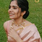 Jisma Jiji Instagram - Pretty pastels & the shimmer of gold. Meenakari work in pastel pink gives a beautiful aura to these pieces from @lakshmijewellery916. Perfect to add that aura of elegance to your look, @lakshmijewellery916 has the best collection of meenakari ornaments ! Visit @lakshmijewellery916 today, to get your hands on their latest collection of designer jewellery ! Costume courtesy: @parishkaari_official