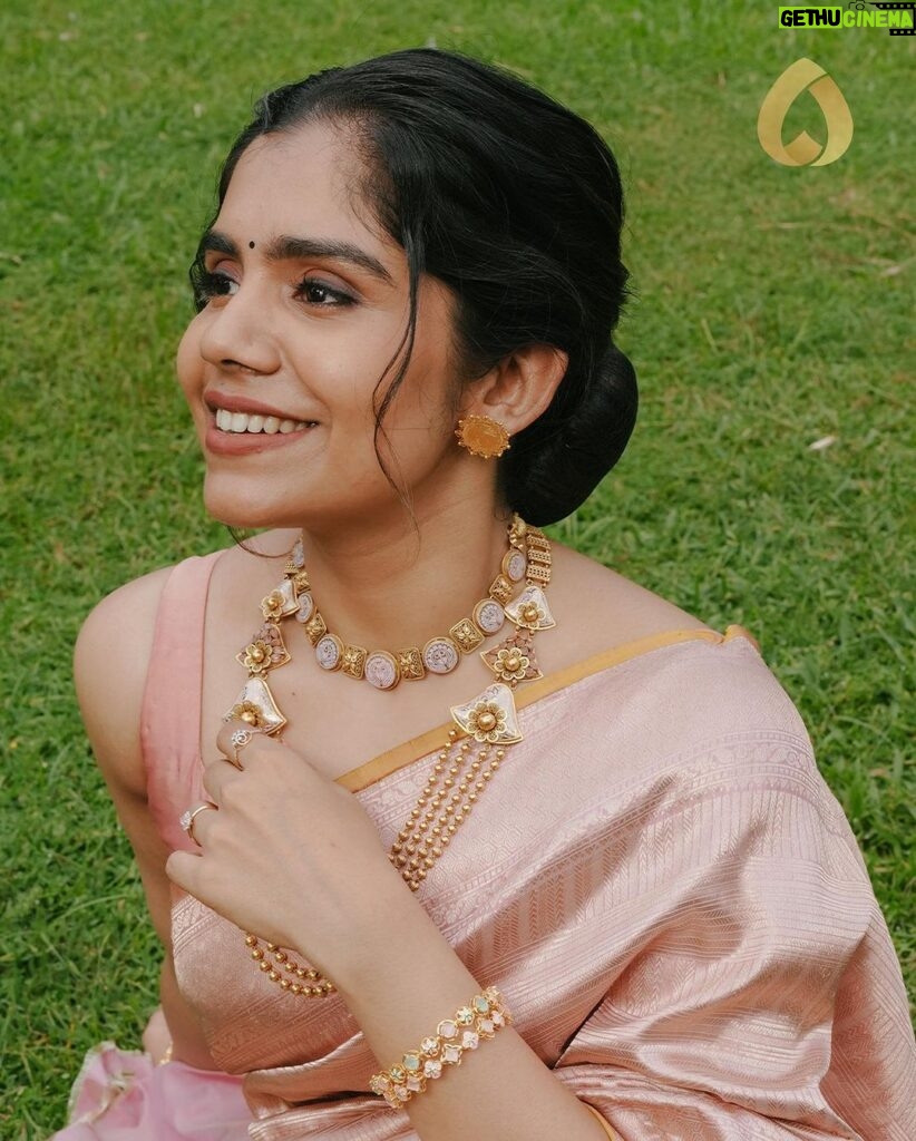 Jisma Jiji Instagram - Pretty pastels & the shimmer of gold. Meenakari work in pastel pink gives a beautiful aura to these pieces from @lakshmijewellery916. Perfect to add that aura of elegance to your look, @lakshmijewellery916 has the best collection of meenakari ornaments ! Visit @lakshmijewellery916 today, to get your hands on their latest collection of designer jewellery ! Costume courtesy: @parishkaari_official