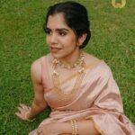 Jisma Jiji Instagram - Pretty pastels & the shimmer of gold. Meenakari work in pastel pink gives a beautiful aura to these pieces from @lakshmijewellery916. Perfect to add that aura of elegance to your look, @lakshmijewellery916 has the best collection of meenakari ornaments ! Visit @lakshmijewellery916 today, to get your hands on their latest collection of designer jewellery ! Costume courtesy: @parishkaari_official