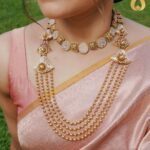 Jisma Jiji Instagram - Pretty pastels & the shimmer of gold. Meenakari work in pastel pink gives a beautiful aura to these pieces from @lakshmijewellery916. Perfect to add that aura of elegance to your look, @lakshmijewellery916 has the best collection of meenakari ornaments ! Visit @lakshmijewellery916 today, to get your hands on their latest collection of designer jewellery ! Costume courtesy: @parishkaari_official