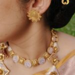 Jisma Jiji Instagram – Pretty pastels & the shimmer of gold. 
Meenakari work in pastel pink gives a beautiful aura to these pieces from @lakshmijewellery916. 

Perfect to add that aura of elegance to your look, @lakshmijewellery916 has the best collection of meenakari ornaments ! 

Visit @lakshmijewellery916 today, to get your hands on their latest collection of designer jewellery !
Costume courtesy: @parishkaari_official
