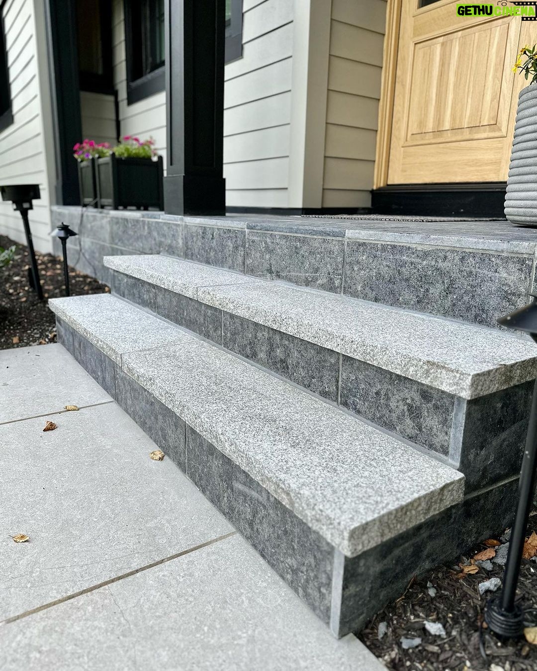 John Colaneri Instagram - #Design is all in the details and the stone work that we did around our home created a major change. When looking to update the exterior of your home always add different textures and materials. This will allow those elements to play off of each other. The earth tones from the new @jameshardie siding and the black granite from @polycor_hardscapes are two materials that work very well together. #curbappeal #exteriordesign #stoneveneer #stonework #designgoals #designinspiration #njdesigner #njbuilders