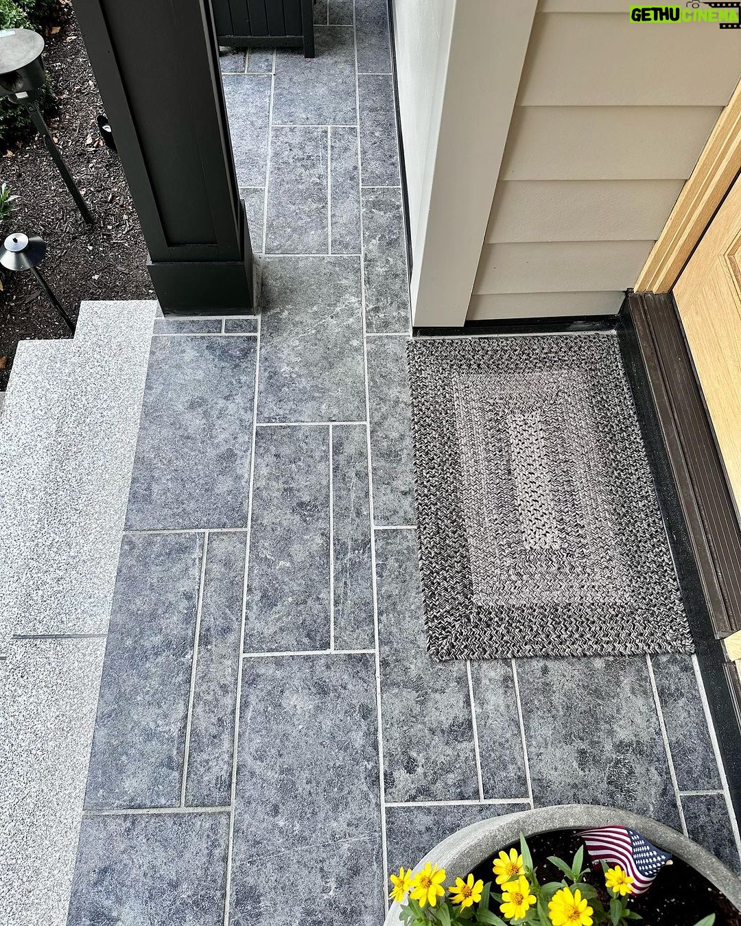 John Colaneri Instagram - #Design is all in the details and the stone work that we did around our home created a major change. When looking to update the exterior of your home always add different textures and materials. This will allow those elements to play off of each other. The earth tones from the new @jameshardie siding and the black granite from @polycor_hardscapes are two materials that work very well together. #curbappeal #exteriordesign #stoneveneer #stonework #designgoals #designinspiration #njdesigner #njbuilders