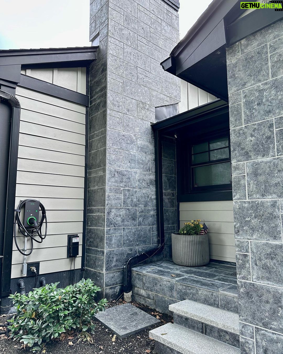 John Colaneri Instagram - #Design is all in the details and the stone work that we did around our home created a major change. When looking to update the exterior of your home always add different textures and materials. This will allow those elements to play off of each other. The earth tones from the new @jameshardie siding and the black granite from @polycor_hardscapes are two materials that work very well together. #curbappeal #exteriordesign #stoneveneer #stonework #designgoals #designinspiration #njdesigner #njbuilders