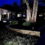 John Colaneri Instagram - Stone walls are complete for summer and #architectuallightingdesign is in full effect! When working with #naturalstone on your property you can get amazing shadow effects when lit at the right angles. I have become obsessed with #landscapelighting and proud of it! LOL. #landscapedesign #stone #stonedesign Stone by @northernvalleystone