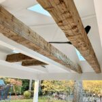John Colaneri Instagram - With Spring here I cannot wait for the exterior projects to start at my clients homes and I have a couple planned at my home this year! I love how my client let me design these hand hewn beams from @realantiquewoodmill into there covered patio and outdoor kitchen! It is such a statement piece in the rear yard! #springdesign #design #designideas #designgoals #designmotivation #njdesigner #njbuilder New Jersey