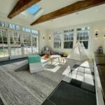 John Colaneri Instagram - My friends at @veluxusa just posted this question and I am interested in your thoughts. In two projects I designed and built I went with two different styles. Exposed reclaimed beams and no beams. What are your thoughts and which one do you like better? Beams or No Beams?? Beams made by @realantiquewoodmill #lilysheadesign #design #designgoals #designinspiration #njdesigner #njbuilders #letthelightin