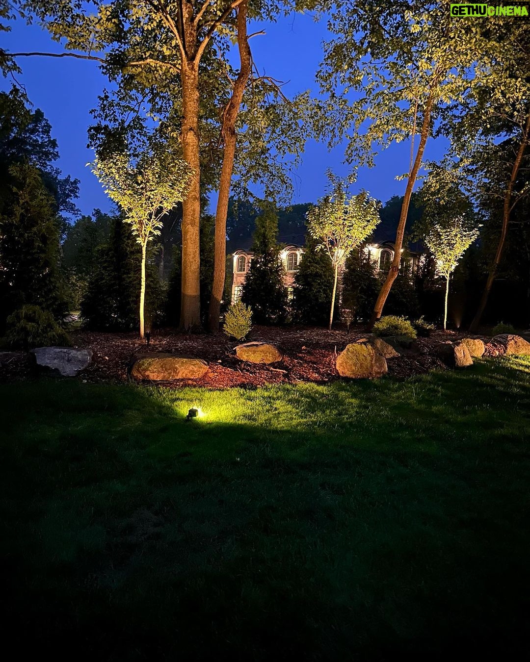 John Colaneri Instagram - Stone walls are complete for summer and #architectuallightingdesign is in full effect! When working with #naturalstone on your property you can get amazing shadow effects when lit at the right angles. I have become obsessed with #landscapelighting and proud of it! LOL. #landscapedesign #stone #stonedesign Stone by @northernvalleystone