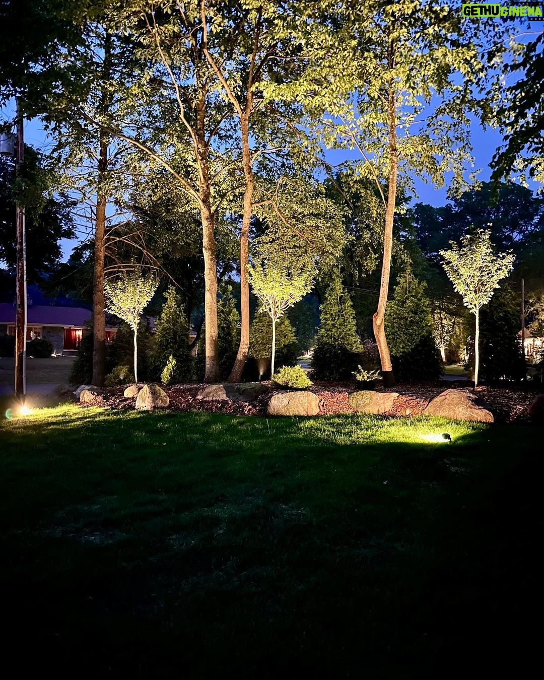 John Colaneri Instagram - Stone walls are complete for summer and #architectuallightingdesign is in full effect! When working with #naturalstone on your property you can get amazing shadow effects when lit at the right angles. I have become obsessed with #landscapelighting and proud of it! LOL. #landscapedesign #stone #stonedesign Stone by @northernvalleystone