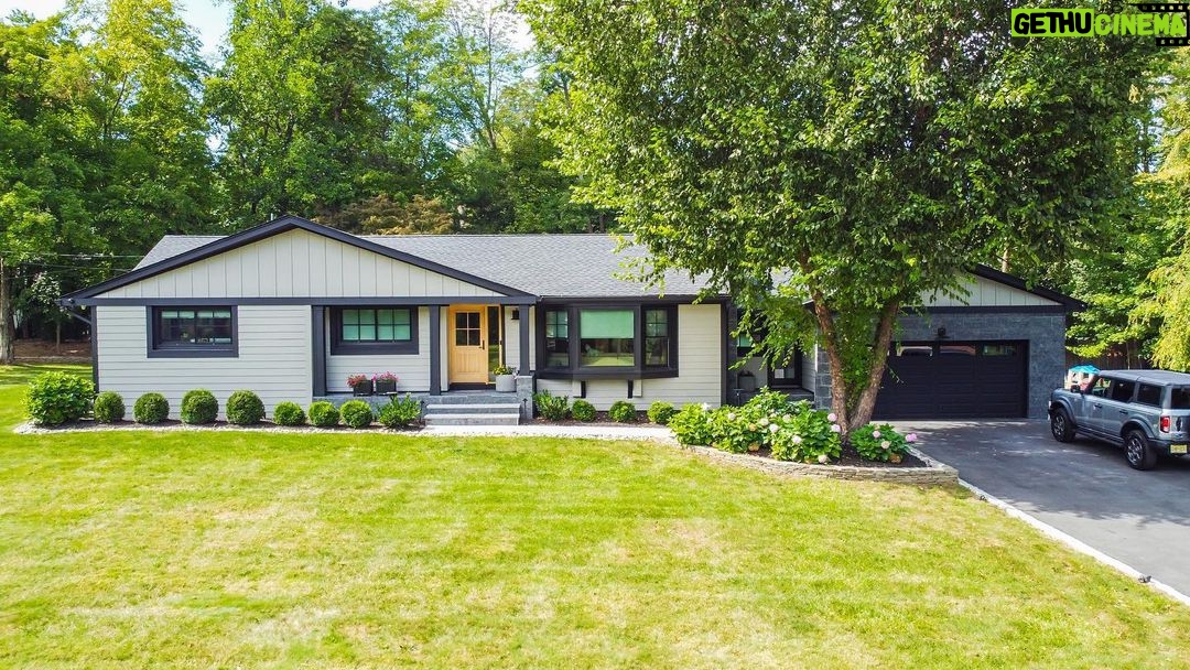 John Colaneri Instagram - #ICYMI check out our collab with HGTV's John Colaneri. Woodhaven supplied all the materials for this epic transformation. 👉🏻Swipe to see the Before & After of his home's exterior. #Woodhaven #HGTV #Transformation #Renovation 🎨 Color: Main siding: Stone Paver / All trim and soffits: Jet Black