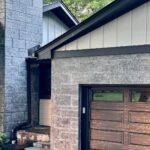 John Colaneri Instagram - Summer #exteriorrenovation complete!! What should I do next? New siding by @jameshardie in Stone Paver color (Magnolia line) New patio and stone accents by @polycor_hardscapes in St. Henry Black Granite #curbappeal #designtrends #designinspo #designer #renovation