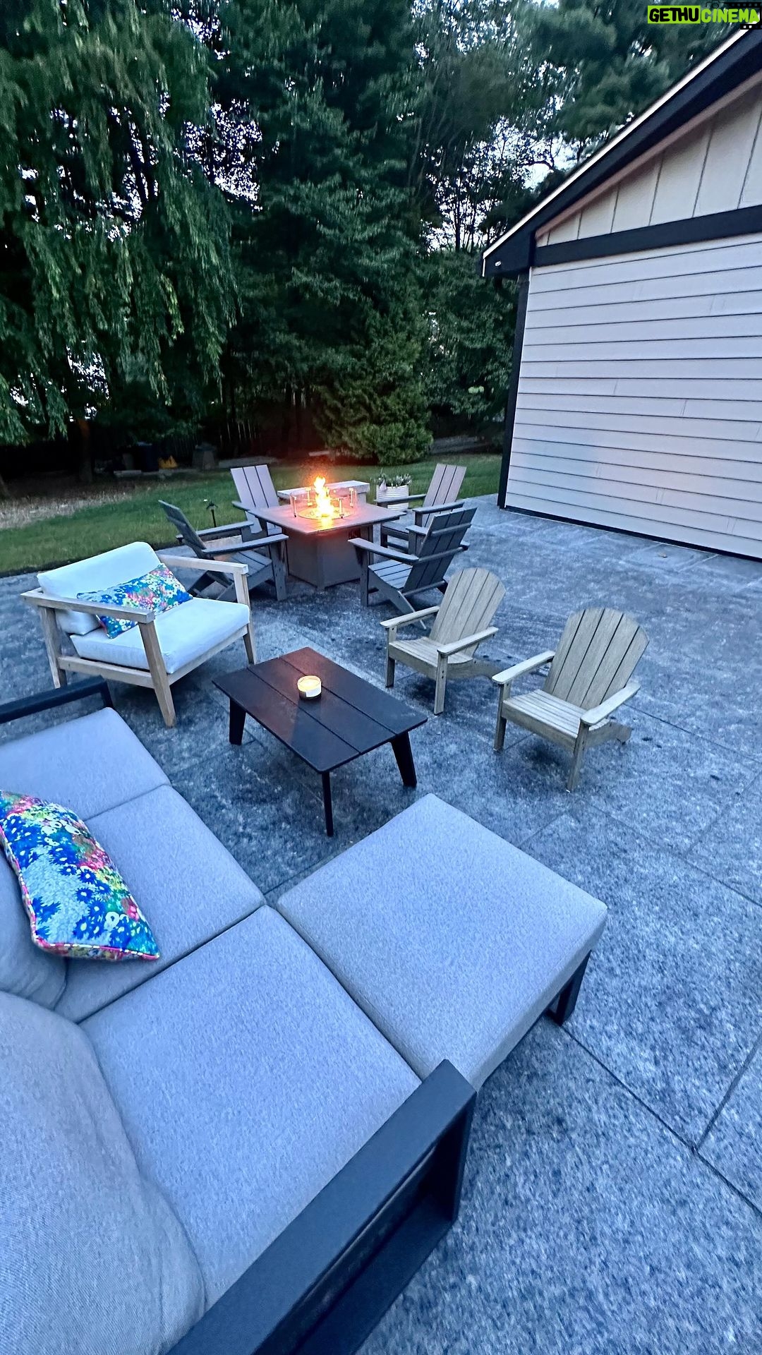 John Colaneri Instagram - Our new patio with @polycor_hardscapes is complete and now we have the dedicated fire pit area that we have always wanted! The XL pavers in the Saint Henry black granite are a statement piece for the backyard. When you have fewer joints the area looks even bigger and much more streamlined. Material supplied by @northernvalleystone #outdoorliving #polycorhardscapes #hardscapes #patiodesign #designgoals