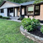 John Colaneri Instagram - We have come to the end of the exterior #renovation! Our home is gone through so many transformations over the past couple of years, but the exterior project is just incredible to witness. My wife and I wanted a color that was moody and had the earth tones that are through the interior of our home. We had to find a way to bring these colors outside. When deciding on the product I had two main points: 1.) Maintenance free 2.) A color that was unique and new The new Stone Paver color from @jameshardie Magnolia line @joannagaines gave us exactly what we wanted and more. The color has beautiful hues of grays and browns that make it unique and really stand out. It changes depending on how the light hits it. We decided to pair it with the black accents and black granite from @polycor_hardscapes. Since the Hardie product is a fiber cement that means no rotting or warping. Living in the Northeast that is a must! Watch to the end to see what our home first looked like when purchased. You have to see through the weeds (literally) to unlock the potential of a home and give you the biggest value. Make your home unique and unlock the perspective of older homes! #exteriordesign #exterior #curbappeal #design #njdesigner #njbuilders #designideas #designinspiration #exteriortransformation -James Hardie product supplied by @woodhavenlumber -Stone material and supplies supplied by @northernvalleystone New Jersey