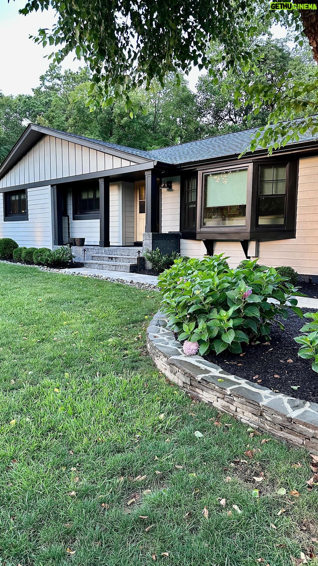 John Colaneri Instagram - We have come to the end of the exterior #renovation! Our home is gone through so many transformations over the past couple of years, but the exterior project is just incredible to witness. My wife and I wanted a color that was moody and had the earth tones that are through the interior of our home. We had to find a way to bring these colors outside. When deciding on the product I had two main points: 1.) Maintenance free 2.) A color that was unique and new The new Stone Paver color from @jameshardie Magnolia line @joannagaines gave us exactly what we wanted and more. The color has beautiful hues of grays and browns that make it unique and really stand out. It changes depending on how the light hits it. We decided to pair it with the black accents and black granite from @polycor_hardscapes. Since the Hardie product is a fiber cement that means no rotting or warping. Living in the Northeast that is a must! Watch to the end to see what our home first looked like when purchased. You have to see through the weeds (literally) to unlock the potential of a home and give you the biggest value. Make your home unique and unlock the perspective of older homes! #exteriordesign #exterior #curbappeal #design #njdesigner #njbuilders #designideas #designinspiration #exteriortransformation -James Hardie product supplied by @woodhavenlumber -Stone material and supplies supplied by @northernvalleystone New Jersey