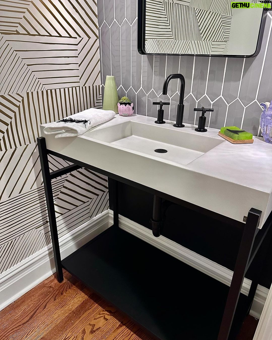 John Colaneri Instagram - A little before and after of my clients powder room! Such a small space can pack a ton of design! It is all in the details when curating a space. #bathroomdesign #bathroomdecor #bathroomremodel #bathroominspiration #bathroomideas #bathroomrenovation Sink and vanity by @trueform_concrete Faucet by @kohler Wallpaper by @thatcher.studio Lighting by @busterandpunch Mirror by @schoolhouse Tile by @tilebar