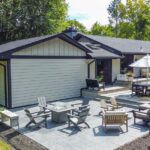 John Colaneri Instagram - #ICYMI check out our collab with HGTV's John Colaneri. Woodhaven supplied all the materials for this epic transformation. 👉🏻Swipe to see the Before & After of his home's exterior. #Woodhaven #HGTV #Transformation #Renovation 🎨 Color: Main siding: Stone Paver / All trim and soffits: Jet Black