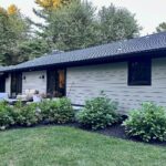 John Colaneri Instagram - A little after and before in the rear of our home. It has gone through some massive transformations over the past couple of years. I have not shared any pictures of the rear complete yet. With the new @jameshardie siding and patio by @polycor_hardscapes it is a great place to entertain and just relax. We now have around 2,000 sq ft of patio space which makes a huge difference to the property. With summer ending the fall is my favorite season by far and I cannot wait to sit around the fire 🔥 pit. @woodhavenlumber @northernvalleystone #design #designinspiration #curbappeal #exteriordesign #exteriordecor #designgoals #njdesigner