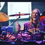 John Dolmayan Instagram – Even before I joined the band we would sit around and marvel at the uniquely intricate drumming of Danny Carey . Tool to me is like a mix of Pink Floyd and Rush, modernizing those sounds and adding an even more prolific singer . I spent many nights in the crowd during Ozzfest laying on the grass and enjoying the power and beauty amplified by the massive speakers . (Their Led Zeppelin cover is amazing !)At some point someone had the bright idea of challenging them to a basketball game ( we lost ). This was the second time system lost ( first time was to slayer , they killed us ) but we began a friendship between the bands that is still thriving today. Danny is on the Mount Rushmore of modern drummers , he balances technic and style perfectly . For someone as tall as he is he’s incredibly graceful and there is a marvelous liquidity to his drumming style . Danny is a shy , introspective person but once you get him comfortable his inner joy and zest for life overtakes you. I have been fortunate to have played with them on stage going back and forth on timbales as he played a solo. Every time we did this was such a thrill and again I count my blessings that these opportunities have been afforded to me. I can’t explain how much respect and admiration I have for Danny and Tool in general . I pray we do a tour together one day and create a massive 2 or 3 drummer solo . I promise to give you a run for your money Danny 🤙