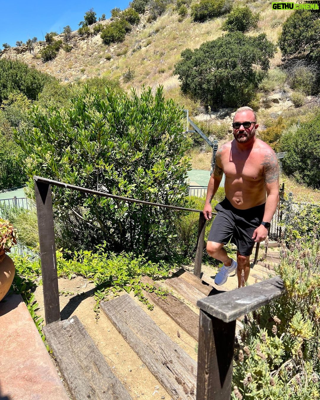 John Feldmann Instagram - When I was a kid I hated sports. Always the last guy to be picked on the team. I had my jaw broken by the quarterback of my high school football team. I played the clarinet and I was OBSESSED with punk rock. I moved to Los Angeles in 1988 and I found my people. Weirdos and freaks. Then I found Fishbone and the Red Hot Chili Peppers. I realized that music could also be an athletic event. I started working out when I was 21. I’m 54 now and have never been in better shape. I know now that working out is a lifestyle. It combats my anxiety, my depression, and is part of my overall mental health plan. Every morning I pray to my HP, take a cold plunge, and say “I LOVE MY LIFE” as loud as I can whether I believe it or not. It works. It really does. Never give up on yourself! I’m so glad I didn’t… Thank you @amy_feldmann and @dr_cp for taking these pics of me today during my morning workout regime. Thank you @glennholmesla for pushing me to be the best version of myself. Calabasas, California