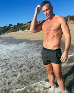 John Hill Instagram - I’m trying to think of a cute caption while my dog poops anyway happy new year from the beach Malibu, California