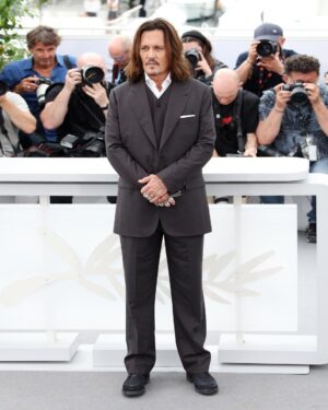 Johnny Depp Instagram - Staying true to his inimitable sense of style, it's been a week of Dior men's hits for @JohnnyDepp at the @FestivaldeCannes 2023. The Ambassador of the Dior Sauvage fragrance joined the cast of "Jeanne du Barry" on the red carpet in a sharp and elegant custom double-breasted tuxedo, wing-tip collar plastron shirt with jewellery buttons and silk pocket square by @MrKimJones. For the film's press conference, the actor donned a grey wool peak-lapel suit with matching vest and black leather boots, while at the Dior x @MadameFigaroFR x @MoetChandon dinner he rocked a chic, striped three-piece suit by the House. Swipe to see the outfits and the #DiorSavoirFaire behind his opening ceremony look. 
#StarsinDior #DiorCannes