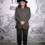 Johnny Depp Instagram – Staying true to his inimitable sense of style, it’s been a week of Dior men’s hits for @JohnnyDepp at the @FestivaldeCannes 2023. The Ambassador of the Dior Sauvage fragrance joined the cast of “Jeanne du Barry” on the red carpet in a sharp and elegant custom double-breasted tuxedo, wing-tip collar plastron shirt with jewellery buttons and silk pocket square by @MrKimJones. For the film’s press conference, the actor donned a grey wool peak-lapel suit with matching vest and black leather boots, while at the Dior x @MadameFigaroFR x @MoetChandon dinner he rocked a chic, striped three-piece suit by the House. Swipe to see the outfits and the #DiorSavoirFaire behind his opening ceremony look. 
#StarsinDior #DiorCannes