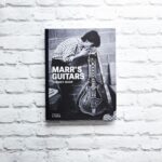 Johnny Marr Instagram – After selling out due to overwhelming demand, ‘Marr’s Guitars’ is now back in stock and available while supplies last. Head to the link in our profile to get your copy now 🔗
 
Tracing Marr’s career from his teenage years to his recent work on the Bond soundtrack, this unmissable book showcases the most significant of Marr’s superb collection of guitars, revealing through them the evolution of his iconic sound and style of playing.
 
@johnnymarrgram