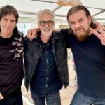 Johnny Marr Instagram - A nice moment with @billyduffyofficial and Howard Bates at @beautifuldaysfestival. Howard was the bass player of Wythenshawe band Slaughter & The Dogs which was the first gig I ever saw aged 12. Thanks again to Billy for playing with us a couple of nights on this tour. Good times.