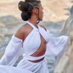 Julia Samantha Edima Instagram - Laissez-vous guider par vos plus belles sensations ce week-end peu importe votre destination 🤍 que la nature vous soit généreuse et pure 🐚🇨🇲 📸 : @_caption12_ Dress : Modeste Alou Direction Artistique : @linprincet #lesplusbellesdestinations #GorgesDeKola #camerounmonbeaupays Gorges De Kola