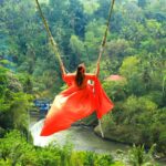 Kanisha Malhotra Instagram - Dear November, Thank you for starting on such a good note. I conquered a fear today. Once upon a time, I was an adrenaline lover. But since my anxiety had kicked in last November, I have always been scared of heights. Since the time I saw Bali swing while I was planning my trip to Bali, I had anxious dreams about doing this. But the moment I sat on it, all my anxiety went away. All I could see was & think was that how beautiful nature is & was smiling the whole time. I am so happy that I did this. The colour of dress really suits me. Do you agree? Let me know in the comments below! #bali #baliswing #swing #flyingdress #balidiaries #travelwithkani #indonesia #explore #trending #photooftheday #iger #november #kanishamalhotra