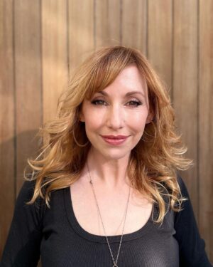 Kari Byron Instagram - I just figured out the color of my hair is redwood. I blend into this background.