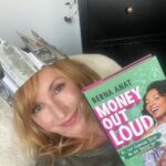 Kari Byron Instagram - Just chillin in my reading chair with my money crown reading my girl Berna’s book. I am so excited that @heyberna wrote it all down. Lucky enough to get an early copy in a package full of goodies. I wish they taught financial literacy in schools. Berna should have her own show! She makes money talk fun and sometimes dances. Go follow her feed! #financialliteracy #money @harperonebooks #moneyoutloud
