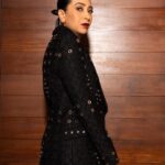 Karisma Kapoor Instagram - True fashion isn't just about what you wear, it reflects your inner self. Thank you @vogueindia @rochelle.pinto for this special night ✨and accolade. It is an honour to be considered one of the Forces of Fashion in India 🙏🏼🖤 Picked out some clothes and accessories from my closet. A sharp suit by @eliesaabworld , an old shirt by @otherstories , my intricate limited edition box clutch by @jimmychoo ( Circa 2011 ) @louisvuitton ring ( Circa 2015 ) and one of my fav comfy gold pumps @alexandrebirman #ForcesOfFashion #BeUrself