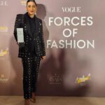 Karisma Kapoor Instagram - True fashion isn't just about what you wear, it reflects your inner self. Thank you @vogueindia @rochelle.pinto for this special night ✨and accolade. It is an honour to be considered one of the Forces of Fashion in India 🙏🏼🖤 Picked out some clothes and accessories from my closet. A sharp suit by @eliesaabworld , an old shirt by @otherstories , my intricate limited edition box clutch by @jimmychoo ( Circa 2011 ) @louisvuitton ring ( Circa 2015 ) and one of my fav comfy gold pumps @alexandrebirman #ForcesOfFashion #BeUrself