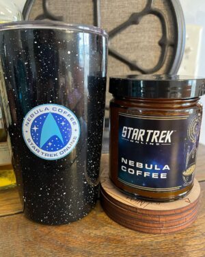 Kate Mulgrew Instagram - Thank you to #StarTrekOnline @trekonlinegame for the Nebula Coffee scented candle & the to-go cup! ☕️🪐💫 Perfect for channeling those Janeway vibes when I have more voice work on the horizon. 

Who has been playing the new STO chapter with Mirror Janeway?