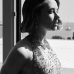 Katherine Langford Instagram - @katherinelangford for @lorealparis in custom @prada and @bulgari jewels, photographed at the 76th Cannes Film Festival. Styled by @mollyddickson, hair by @stephanelancien and make-up by @thevalgarland. #KatherineLangford #LOreal #Prada #Bulgari #Cannes #CannesFilmFestival #Leica #GregWilliamsPhotography #GregWilliams