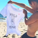 Kentaro Kameyama Instagram - “World Peace” What can we do about this…? When we take a CLOSER look at it, we can always find something to make things better. My “World Peace T” is available for purchase at www.kentarokameyama.com Enjoy the rest of your summer! #worldpeace #fashion #summer Malibu Beach