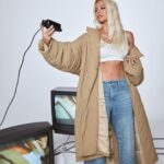 Khloé Kardashian Instagram – Coat check 🤍new @goodamerican