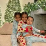Khloé Kardashian Instagram - The MOST magical time of year!!! We are in the Christmas spirit in our Christmas pajamas and our Christmas dance moves 🎄🎄 🤶🏼🤶🏼🎅🏼🎅🏼♥️♥️🎄🎄 pajamas: @zipnbear